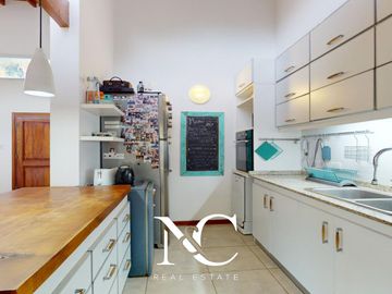 Casa en venta en Costa Esmeralda con fondo libre arbolado