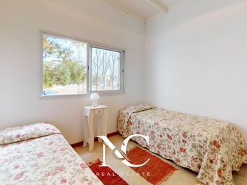 Casa en venta en Costa Esmeralda con fondo libre arbolado