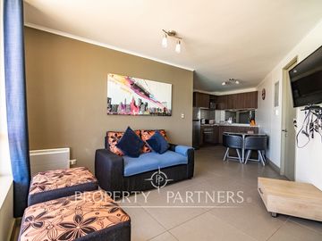 Acogedor departamento amoblado en condominio con vista al mar