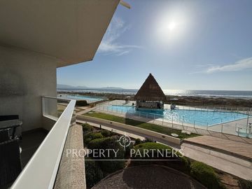 Acogedor departamento amoblado en condominio con vista al mar