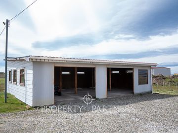 Gran terreno con hermosa casa en KM 9 1/2 Norte