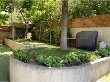 Amplio departamento con jardín privado en Vitacura