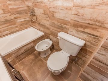 Departamento a estrenar en venta en Villa Luro, un ambiente, balcon al frente, cochera, piscina