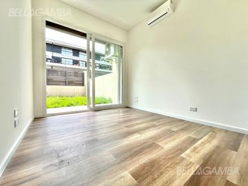 DEPARTAMENTO DE 2 AMBIENTES A ESTRENAR CON JARDIN Y COCHERA