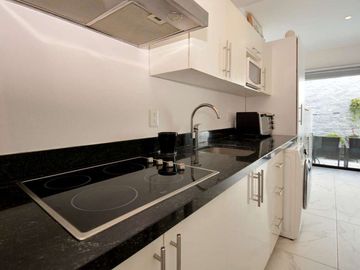 ENCANTADOR DEPARTAMENTO DE UNA RECÁMARA CON PATIO Y JACUZZI, EXCELENTE UBICACIÓN
