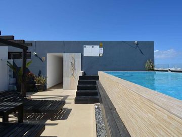 ENCANTADOR DEPARTAMENTO DE UNA RECÁMARA CON PATIO Y JACUZZI, EXCELENTE UBICACIÓN