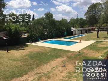 Impecable departamento en Planta baja con parrilla propia y piscina en Complejo Las Cavas
