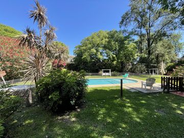 Casa 4 dormitorios en condominio Fisherton - Permuta