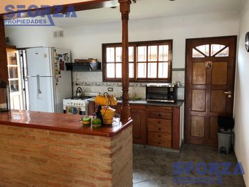 Casa - Muñiz