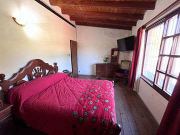 Venta casa de tres dormitorios con galeria, parrillero y quincho 180 m2 en Funes, garita 9