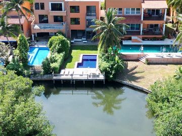 CASA FRENTE A LAGUNA EN CANCUN 4 RECAMARAS COLDWELL BANKER