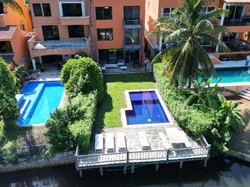 CASA FRENTE A LAGUNA EN CANCUN 4 RECAMARAS COLDWELL BANKER
