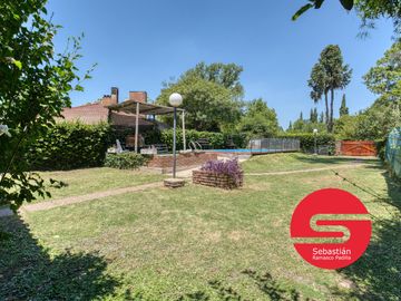Casa venta en Funes 2 dormitorios piscina jardin parrillero
