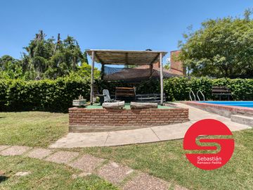 Casa venta en Funes 2 dormitorios piscina jardin parrillero