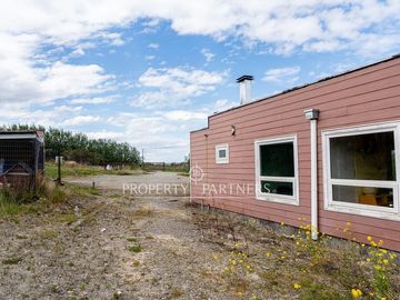 Gran terreno con casa en sector Leñadura