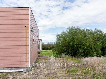 Gran terreno con casa en sector Leñadura