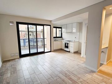 DEPARTAMENTO DE DOS DORMITORIOS DUPLEX VENTA TERRAZA Y PARRILLERO EXCLUSIVO CENTRO ROSARIO