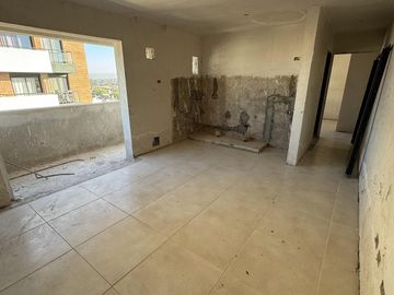 Departamento a estrenar frente con balcón y amenities sobre Avenida Colón