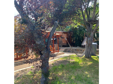 TERRENO CON DOS CABAÑAS EN LA HERMOSA CIUDAD DE OLMUÈ