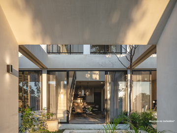 Departamento con recámara en planta baja y jardín