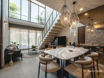 Departamento con recámara en planta baja y jardín