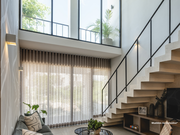 Departamento con recámara en planta baja y jardín