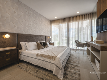 Departamento con recámara en planta baja y jardín