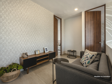 Departamento con recámara en planta baja y jardín