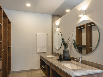Departamento con recámara en planta baja y jardín