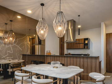 Departamento con recámara en planta baja y jardín