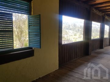 CASA Y TERRENO DE VENTA ZHIDMAD AZUAY