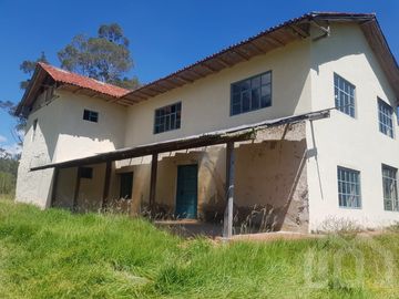 CASA Y TERRENO DE VENTA ZHIDMAD AZUAY