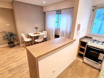 VENDO DEPARTAMENTO 2 AMBIENTES EN ZONA CENTRO COMPLETAMENTE EQUIPADO Y RECICLADO