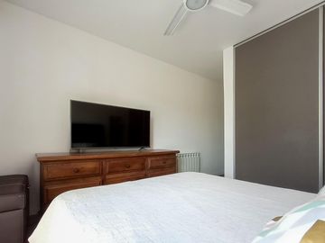VENTA/PERMUTA - Departamento 1 dormitorio con patio y cochera - Condominio Ocho Sauces, Funes.