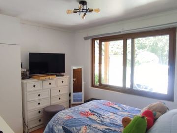 PARCELA CON JARDIN FORMADO, PISCINA Y QUINCHO,SIN REGLAMENTO
