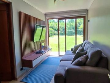 PARCELA CON JARDIN FORMADO, PISCINA Y QUINCHO,SIN REGLAMENTO