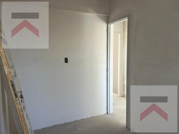 Duplex de 3 Dormitorios, con cochera y Jardin con parilla.