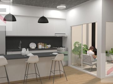 Duplex de 3 Dormitorios, con cochera y Jardin con parilla.