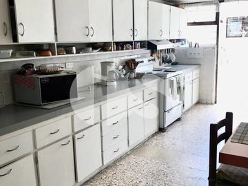 TERRENO DE VENTA CON CASA  SECTOR LA CAROLINA  PARA CONSTRUCTORES