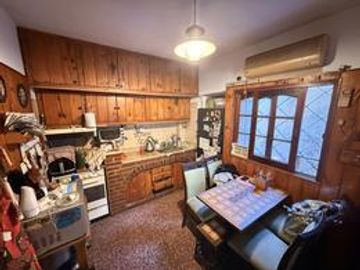 APTO CREDITO ACEPTA PERMUTA CASA 5 AMBIENTES CON COCHERA Y PARRILLA EN BALLESTER