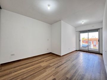 VENTA - Departamento a estrenar de dos dormitorios con balcón al norte y cochera. Lourdes, Rosario