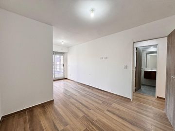 VENTA - Departamento a estrenar de dos dormitorios con balcón al norte y cochera. Lourdes, Rosario