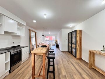 VENTA - Departamento a estrenar de dos dormitorios con balcón al norte y cochera. Lourdes, Rosario