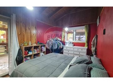 Parcela con 3 casas y gran piscina en Linderos