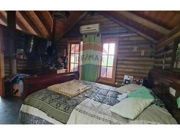 Parcela con 3 casas y gran piscina en Linderos