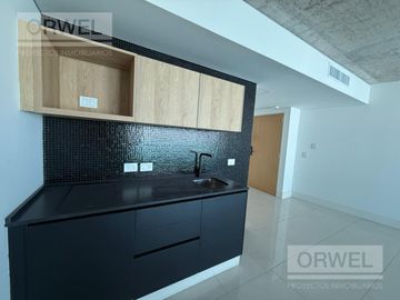Excelente Departamento en piso alto con balcón y luz natural a la venta