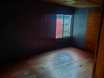 Sitio con casa de madera para remodelar en Angol
