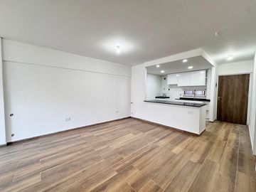 VENTA - Departamento a estrenar de dos dormitorios con balcón al norte y cochera. Lourdes, Rosario.