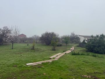 PARCELA CON CASA REGULARIZADA EN CONDIMINIO