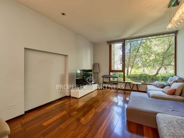 Departamento con finas terminaciones y con jardín privado